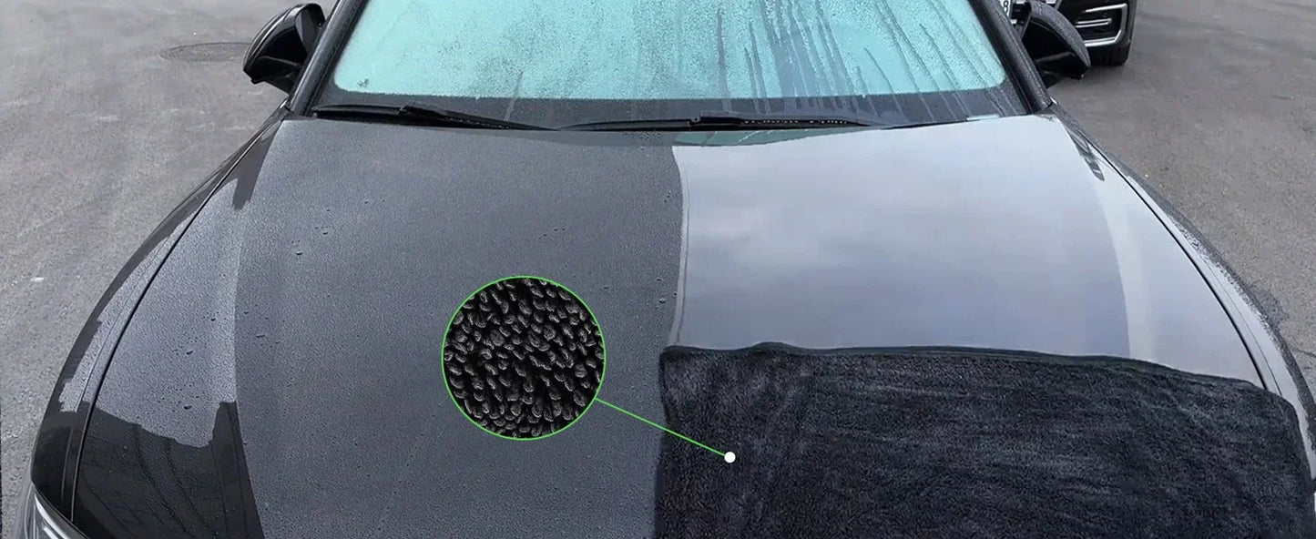 3pc ultra-absorbent microfiber cleaning cloths displayed on a wet black car hood, highlighting texture and absorbency.