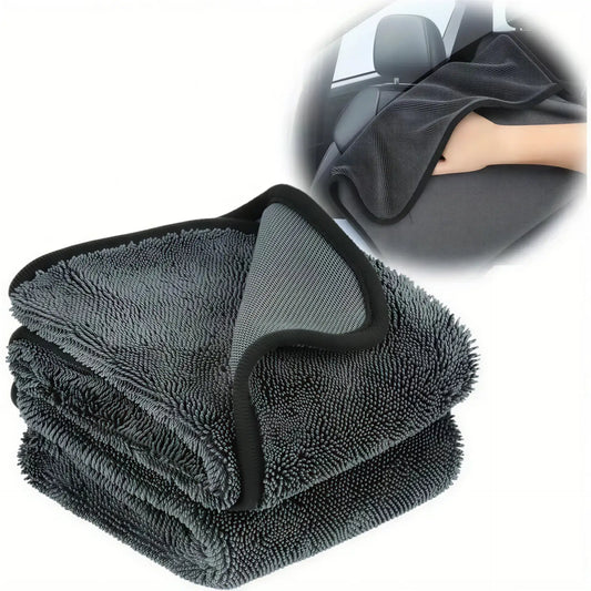 Three stacked ultra-absorbent microfiber cleaning cloths in dark gray with a textured surface and black trim.